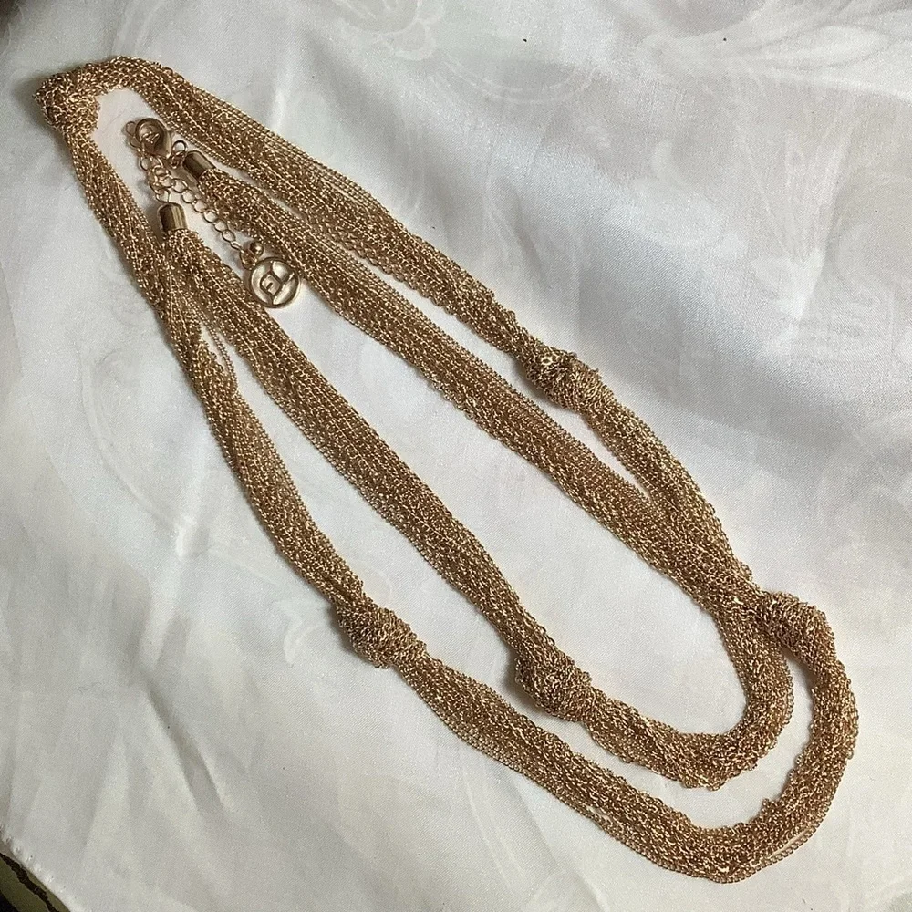 EL by Erica Lyons Gold Tone Long Knotted Statement Necklace 41-45 Inches Adjust
